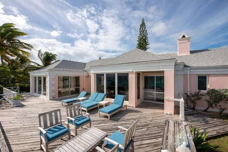 Patio deck with lounging and dining experience.