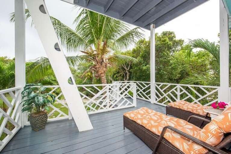 Enjoy some quite time! Covered porch with chaise lounge chairs