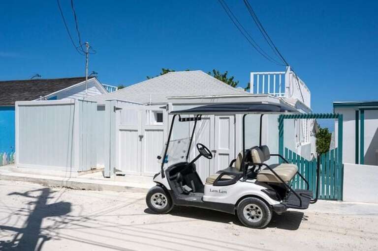 View from street.  Lillian's Cottage is a short walk from excellent beachfront restaurants including Pink Sands and Coral Sands