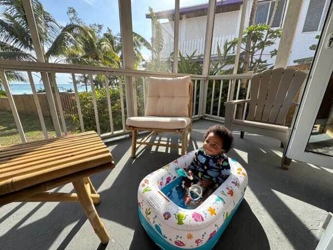 Front Porch at Winfield Manor with inflatable infant pool.
