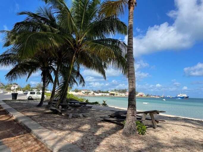 Town of Governors Harbour, collection of 19th century homes and churches overlooking a picturesque harbor.  This harbor beach is a short walk from Winfield Manor.
