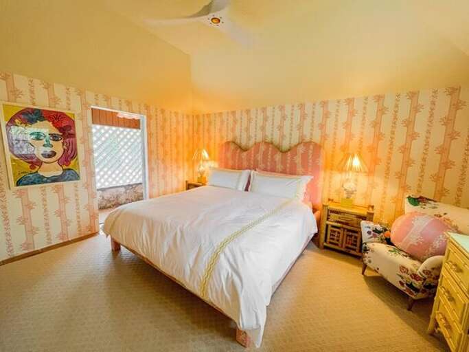 Guest bedroom with king bed with en-suite full bath. Guest bedroom with king bed with en-suite full bath.