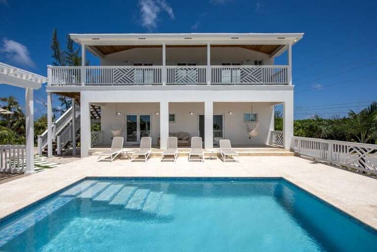 The 12 x 20 heated pool with plenty of room for family gatherings. Enjoy two hammock chairs on the lower deck facing the pool. The 12 x 20 heated pool with plenty of room for family gatherings. Enjoy two hammock chairs on the lower deck facing the pool.