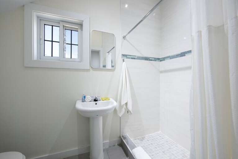 Guest bath with walk-in shower. Guest bath with walk-in shower.