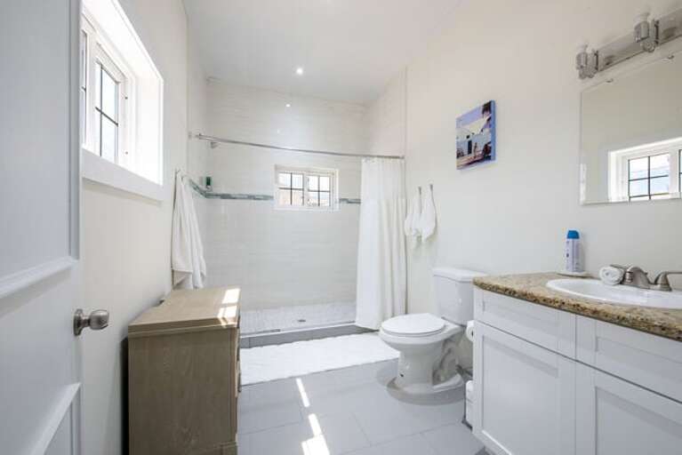 Master bath with walk-in shower. Master bath with walk-in shower.