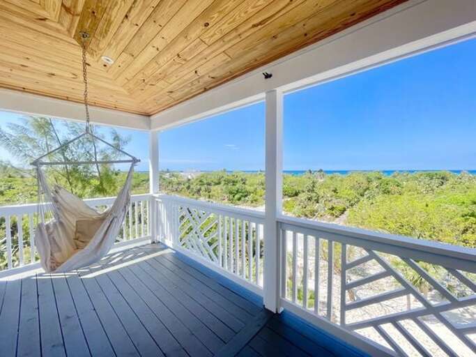 Upper deck with hammock chairs and ocean views Upper deck with hammock chairs and ocean views