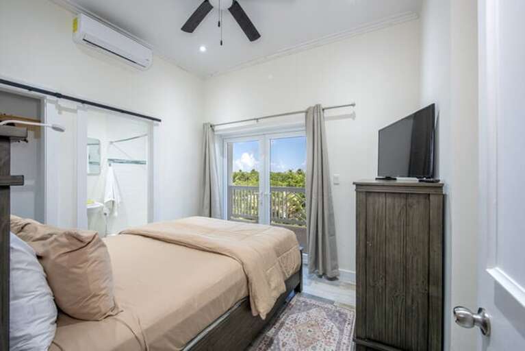 Bedroom Two with queen bed and en-suite bathroom.