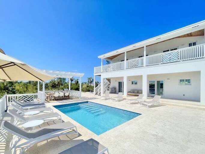 Pool showing the Main House.  The 12 x 20 heated pool has plenty of room for family gatherings.