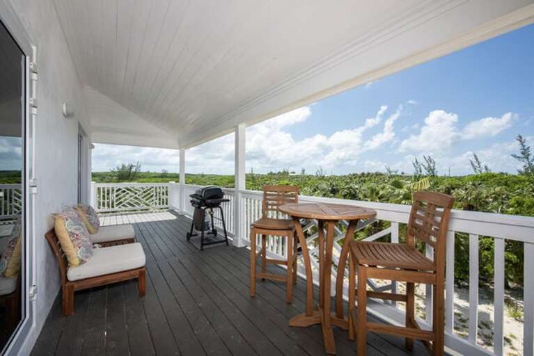 Simple Life's veranda with gas grill.