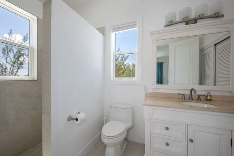 Carriage house one of two en-suite baths with walk-in showers. Carriage house one of two en-suite baths with walk-in showers.