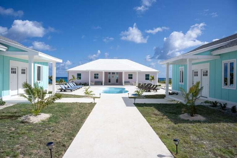 Main house, cottages and pool. Main house, cottages and pool.