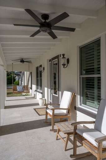 Front porch with porch swing.