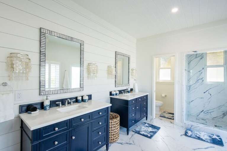 Master bath with walk-in shower and separate tub.