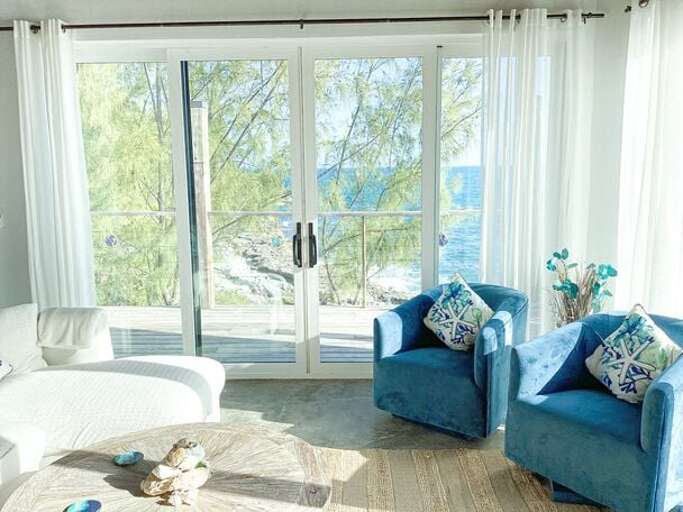 The south side sliding glass doors let you watch the ocean, sunsets and relax on the sectional couch that is quite cozy and comfortable.