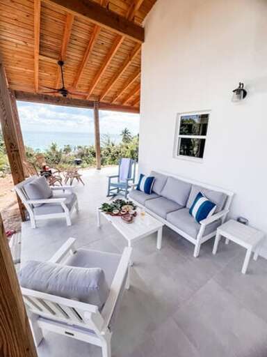 Lounge on the back porch, taking in the sights and sounds of the ocean.  Grill your fresh lobster and fish on our outdoor grill (visible in background).