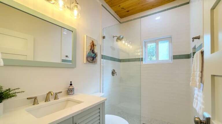 Guest bath with walk-in shower.