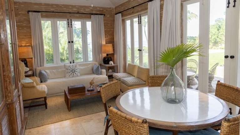 Breakfast room off the kitchen with harbour views and dining for five.