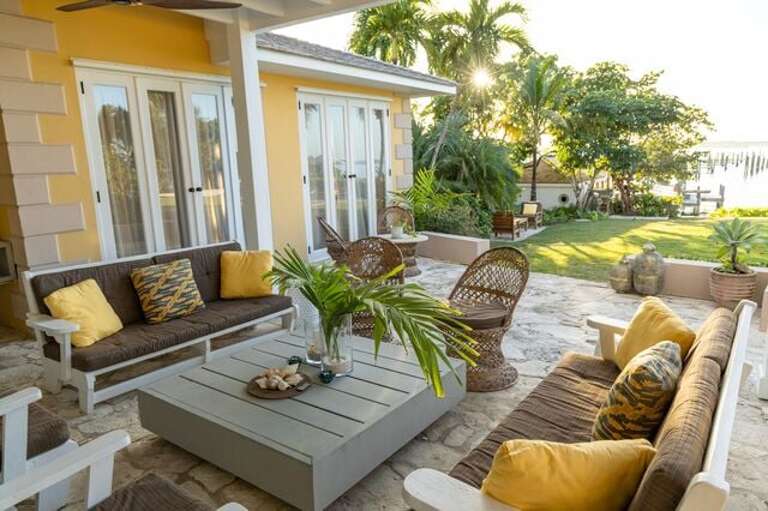 Covered porch with seating.