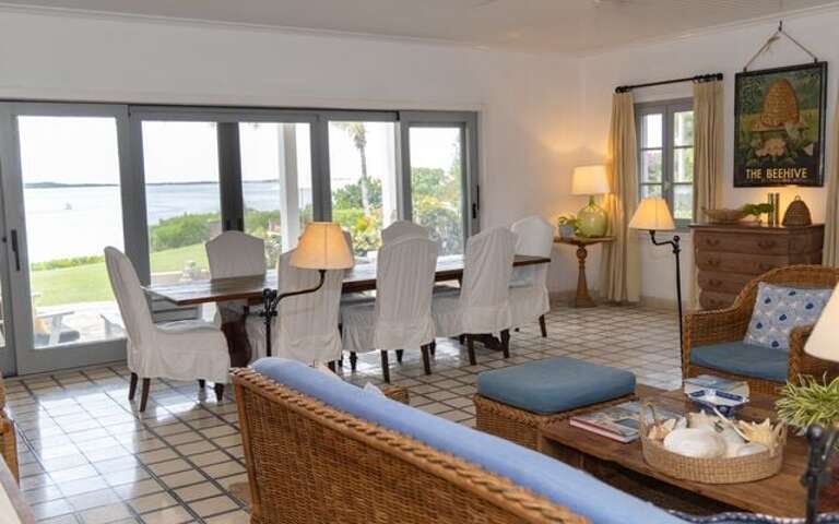 Elegant open-plan living area with sweeping harbour views.