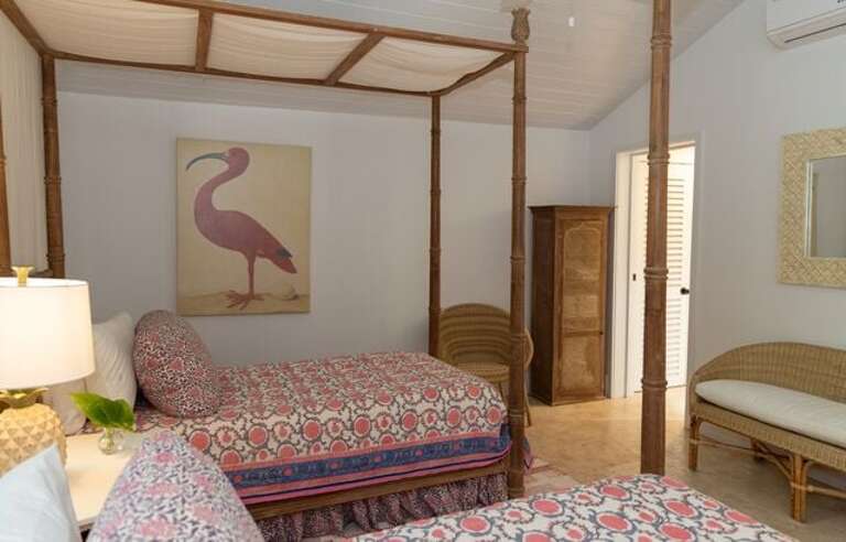 Main house bedroom with twin beds.