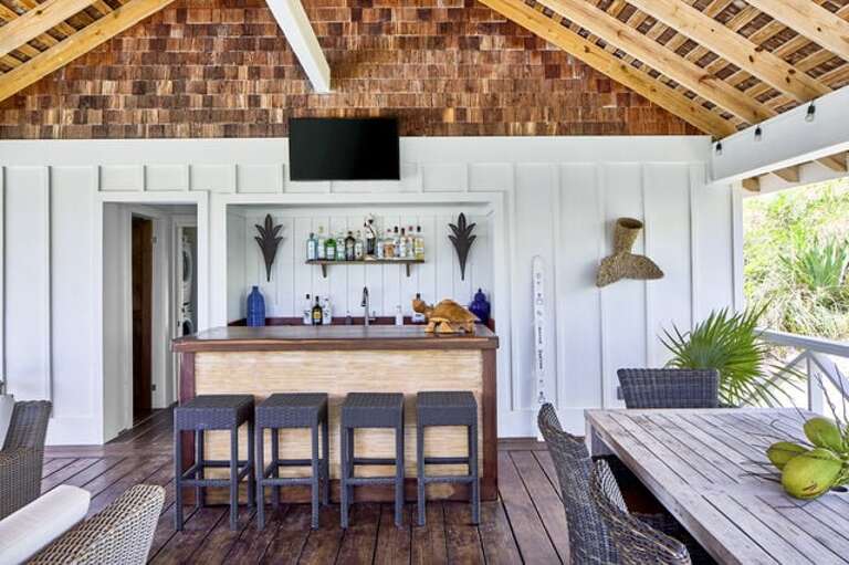 The Pool House has a fully stocked bar on the honor system.