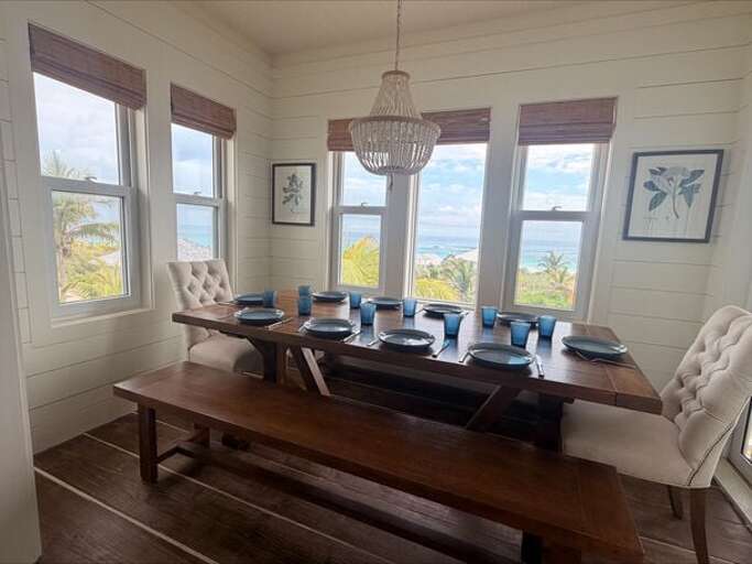 Traveler - Two-bedroom house:  Dining area with ocean view and seating for 10 or more.