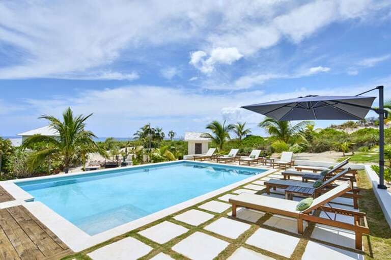 Our heated ocean-view pool with lounge chairs.