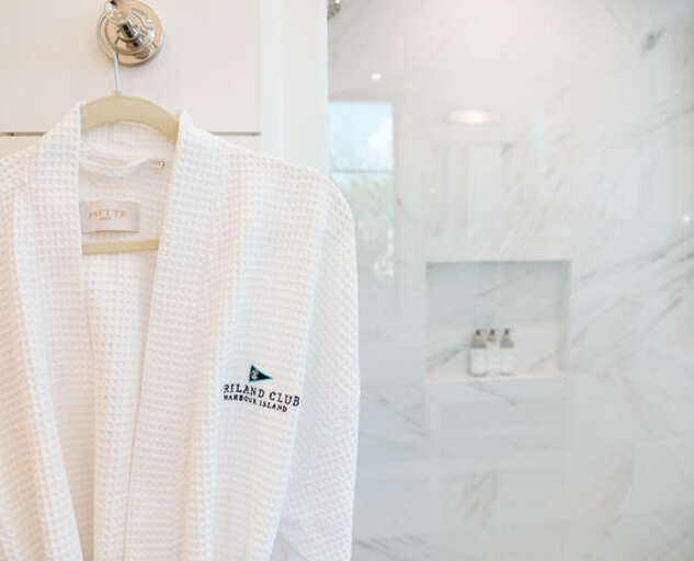 Bath with walk-in shower.