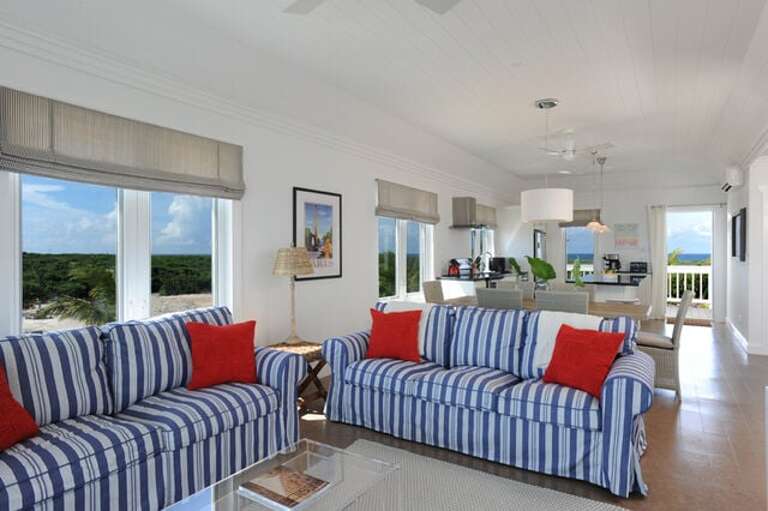 Typical condominium living area with panoramic views of both oceans.  The property has 8 condominiums plus the Main Lodge.
