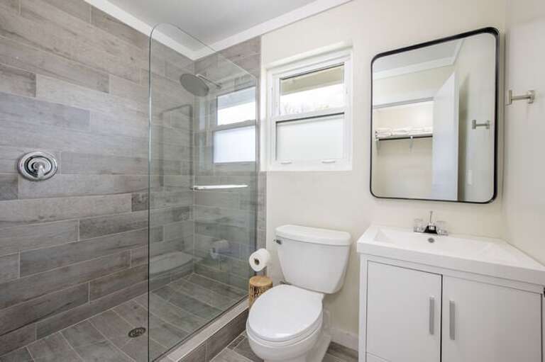 Fifth Bedroom's en-suite full bath with a walk-in shower.