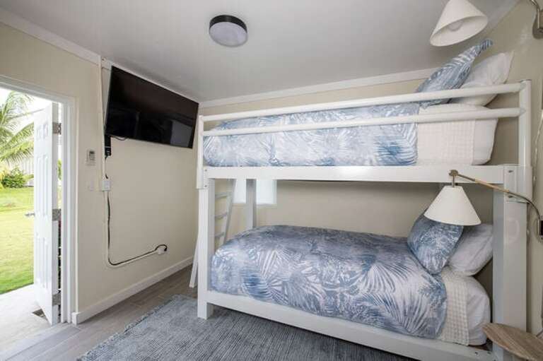The estate's fifth bedroom with an XL twin bunk bed, suitable for staff or teens.