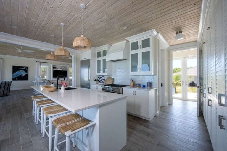 The luxurious island kitchen, finished in quarts and stainless steel.