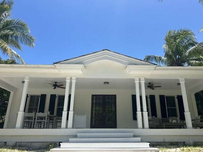 Open air veranda with dining and  lounging