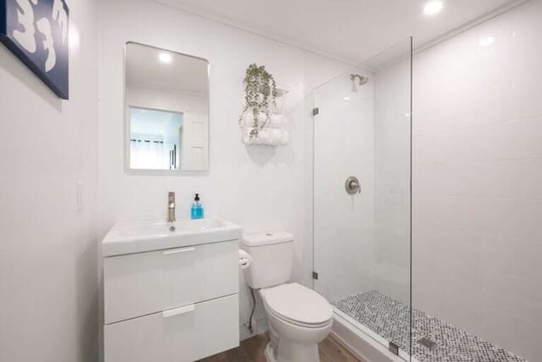 Bath with walk-in shower.