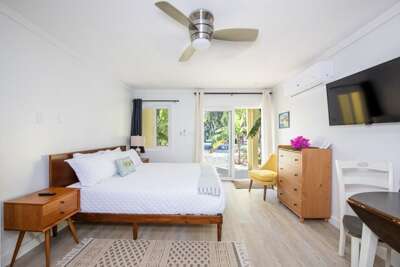 Laughing Bird Unit 6, studio apartment with king size bed.