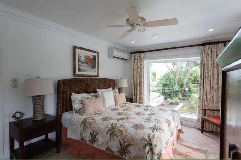 King size bedroom in the Main house with attached full bathroom.