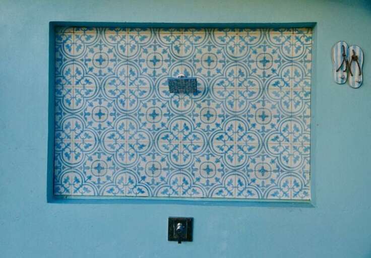 Outdoor shower with hot and cold water.