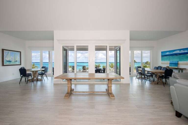 Dining with a view and plenty of dining chairs.  (There are chairs for the third table.)