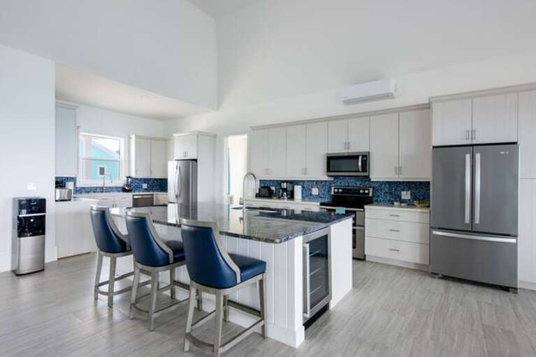 Luxurious double kitchen finished in granite and stainless steel.