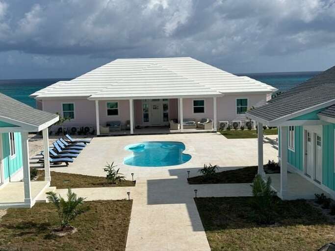 Pink Sands Point beachfront estate.  The two adjacent cottages can be added to the rental if needed.  If not needed, they will be locked off and not rented to anyone else.