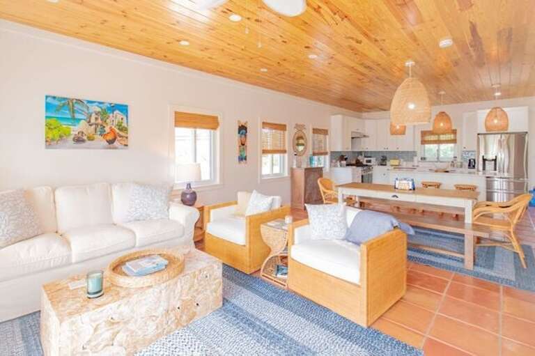 Professionally decorated home features a large open-plan great room.