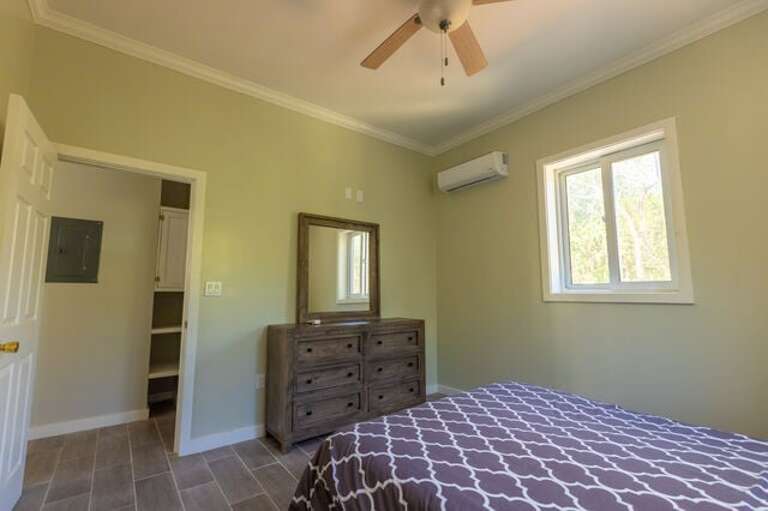 The second bedroom has a queen bed and large closet.