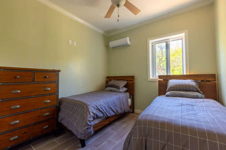 The third bedroom has twin beds which can be positioned together to form a king-width bed if required.