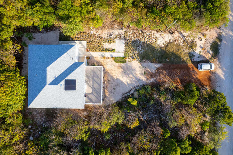 The house is part run by solar power with backup batteries which give uninterrupted power.