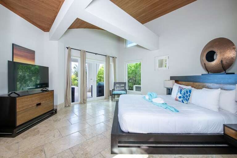 Master bedroom with king size bed.