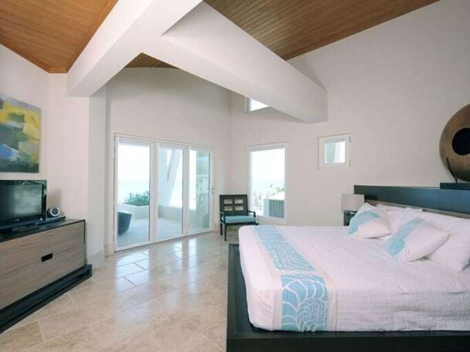 One of four bedrooms (there is a TV in the great room only)