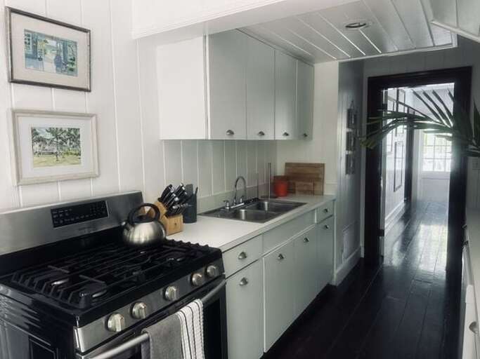 Fully equipped galley kitchen.