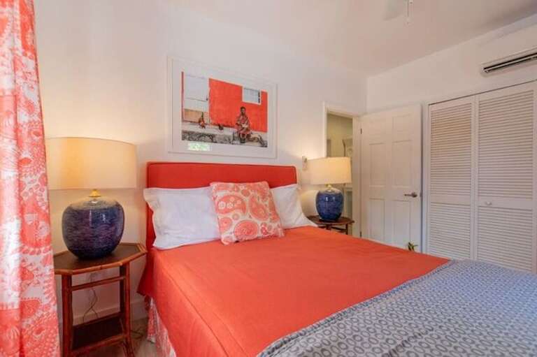 Bedroom with queen size bed.