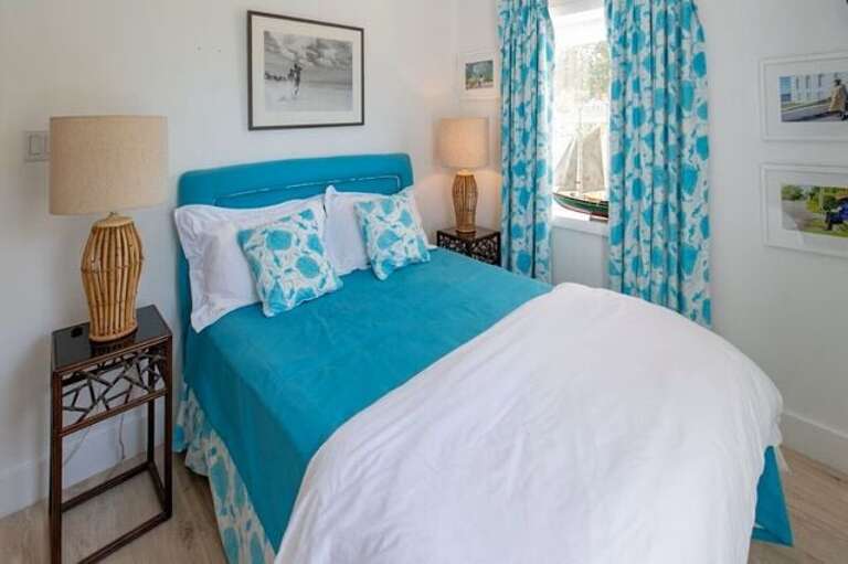 Bedroom with queen size bed.