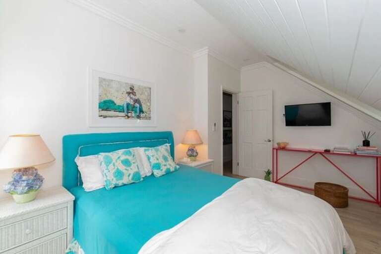 Bedroom with queen size bed.